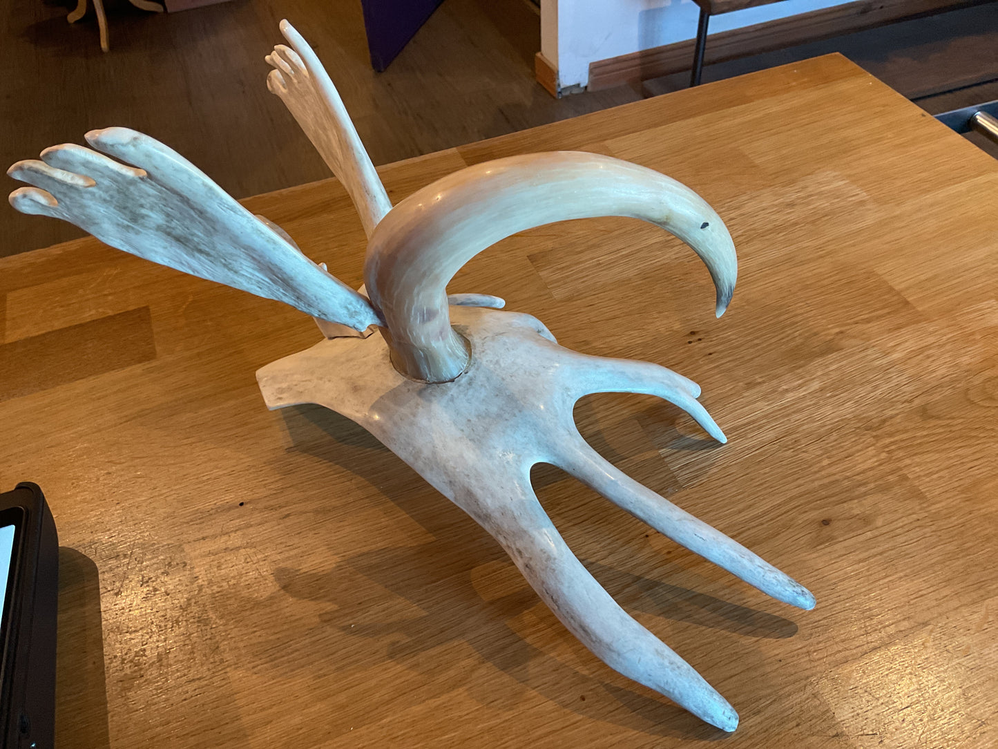 bird with mos ox and caribou antler by Sammy Kudluk